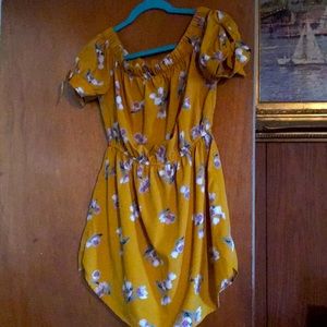 A short dress to wear alone or with leggings.